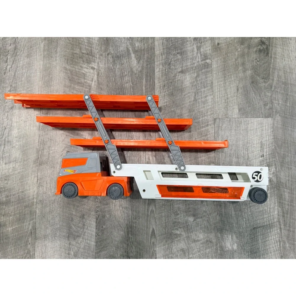 Hot Wheels Mega Hauler Truck 50th Anniversary Expandable 6-Level Transporter